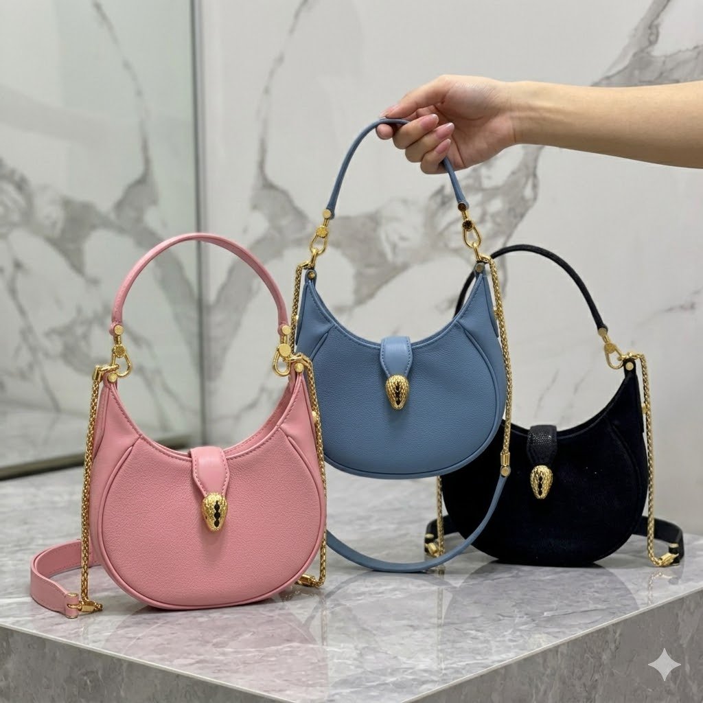 28-47.jpg BVLGARI 宝格丽 Serpenti Ellipse 系列小型斜挎包20cm 小牛皮半月形 Hobo 单肩包 配蛇头搭扣