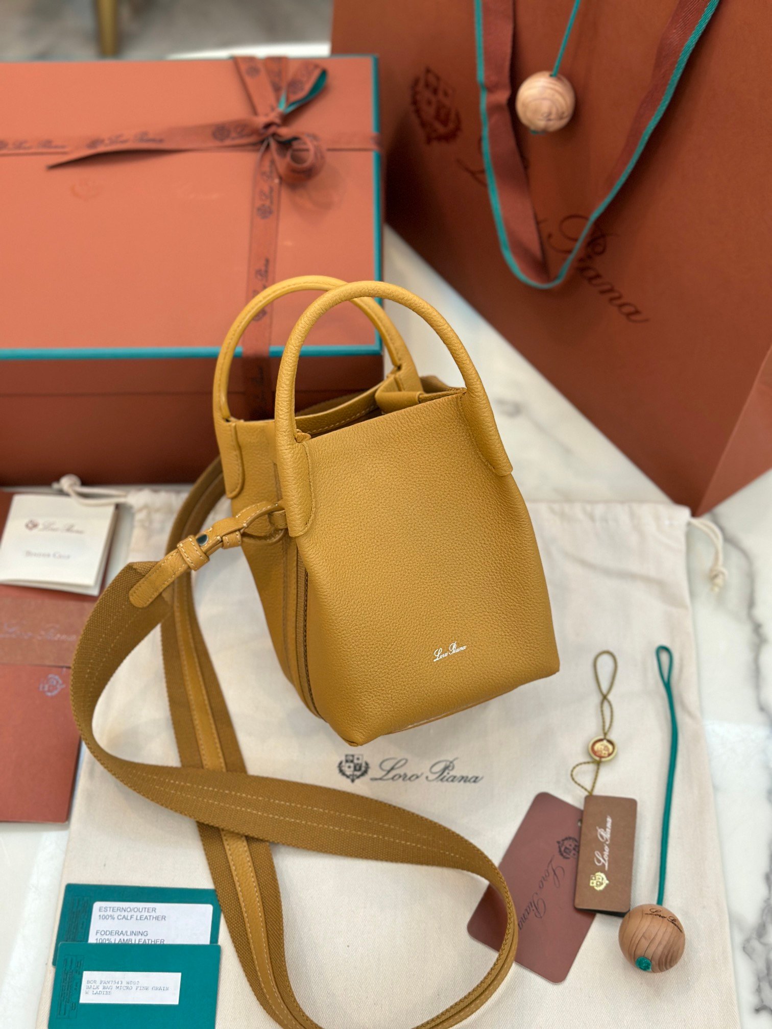 46-17.jpeg Loro Piana 诺悠翩雅 Bale 迷你水桶包16x23cm 粒面小牛皮肩背与斜挎手袋 - 图片 13